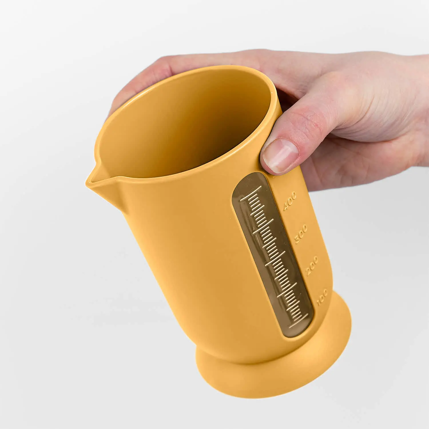 Ufo Blim Plus: citrus juicer with graduated carafe up to 500 ml in Desert color, with anti-drip spout